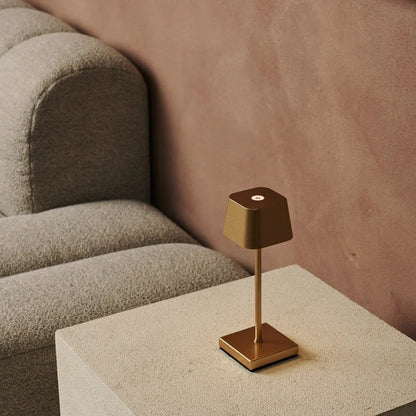 Sarphati Mini Gold Cordless Table Lamp | Rechargeable via Charging Station & 3 Light Modes
